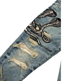 AMIRI COBRA EMBDOIDERED DISTRESSED JEANS