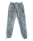 DRIPNORD AMIRI aged grey cotton blend sweatpants with drawstring waist and elasticated cuffs.