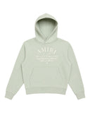 DRIPNORD AMIRI Arts District light green cotton hoodie with cream text graphic and front pocket. Oversized fit.