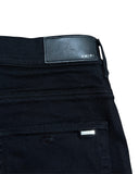 DRIPNORD black Amiri core logo jeans with leather patch detail and metal logo tab.