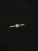 DRIPNORD black cotton Amiri MA Bar hoodie with embroidered logo detail. Features a classic hood and front pocket.