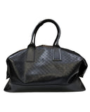 DRIPNORD black Intrecciato-woven calfskin duffel bag with twin carry handles and zip closure.