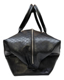DRIPNORD black intrecciato-woven calfskin holdall duffel bag with twin carry handles and a two-way zip closure.