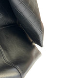 DRIPNORD black intrecciato-woven calfskin duffel bag with rolled handles and zip closure.