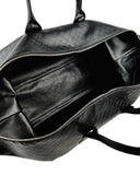 DRIPNORD black intrecciato-woven calfskin duffel bag with twin carry handles and zip closure.