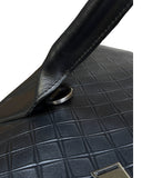 DRIPNORD black intrecciato-woven calfskin holdall duffel bag with rolled handles and silver hardware.