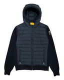 DRIPNORD black knit cardigan with puffer front and hood, featuring a yellow snap closure and logo patch.