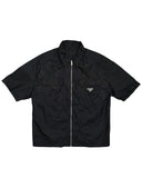 DRIPNORD black Prada Re-Nylon short-sleeve zip-up shirt with chest pockets and triangular logo patch.