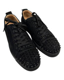 DRIPNORD black suede Christian Louboutin Junior Spikes sneakers with black spikes on the toe box and laces.