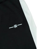 DRIPNORD black track pants with white side stripe and embroidered logo.