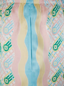 DRIPNORD Casablanca Ping Pong silk shorts with pastel wavy stripes and comet graphic print.