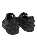 DRIPNORD Christian Louboutin black leather sneakers with signature spikes on heel and textured upper. Size 45.