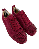 DRIPNORD Christian Louboutin Junior Spikes red suede sneakers with tonal laces and signature red spikes on the toe.
