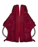 DRIPNORD Christian Louboutin Junior Spikes red suede low-top sneakers with signature spikes on the toe box.