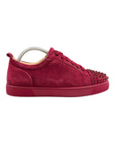 DRIPNORD Christian Louboutin Junior Spikes red suede sneakers with signature red sole and spiked toe.