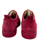 DRIPNORD Christian Louboutin Junior Spikes red suede low-top sneakers with signature red soles.