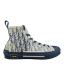 DRIPNORD Dior B23 Oblique high-top sneakers in blue and white monogram print with navy blue laces and sole.
