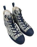 DRIPNORD Dior B23 Oblique sneakers in white with navy blue Dior monogram print and navy blue rubber toe cap and sole.