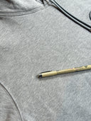 DRIPNORD grey cotton DIOR CD ICON HOODIE with drawstring, showing a small mark on the fabric.