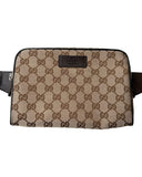 DRIPNORD Gucci GG canvas belt bag in beige and brown with leather trim and adjustable strap.