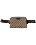 DRIPNORD Gucci GG canvas belt bag in brown with leather trim and silver buckle. Classic monogram pattern.