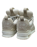 DRIPNORD Louis Vuitton LV Skate Sneakers in beige suede and canvas. Features LV monogram detail and "1854 Since" logo.