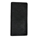 DRIPNORD black leather Louis Vuitton Shadow Brazza wallet with embossed monogram pattern and multiple card slots.
