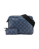 DRIPNORD Louis Vuitton Shadow Duo Messenger bag in navy blue with tonal monogram pattern and black strap, includes matching pouch.
