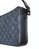 DRIPNORD Louis Vuitton Shadow Duo Messenger bag in navy blue leather with embossed monogram pattern and black hardware.