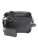 DRIPNORD Louis Vuitton Trio Messenger bag in black monogram canvas with adjustable strap and detachable pouch.