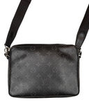 DRIPNORD Louis Vuitton Trio Messenger bag in black monogram canvas with adjustable strap.