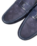 DRIPNORD navy blue Louis Vuitton loafers with monogram pattern and silver-tone LV buckle detail.