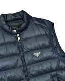 DRIPNORD navy blue Prada puffer vest with zip closure and iconic triangle logo patch.