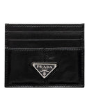 DRIPNORD Prada black leather card holder with multiple card slots and iconic silver triangle logo.