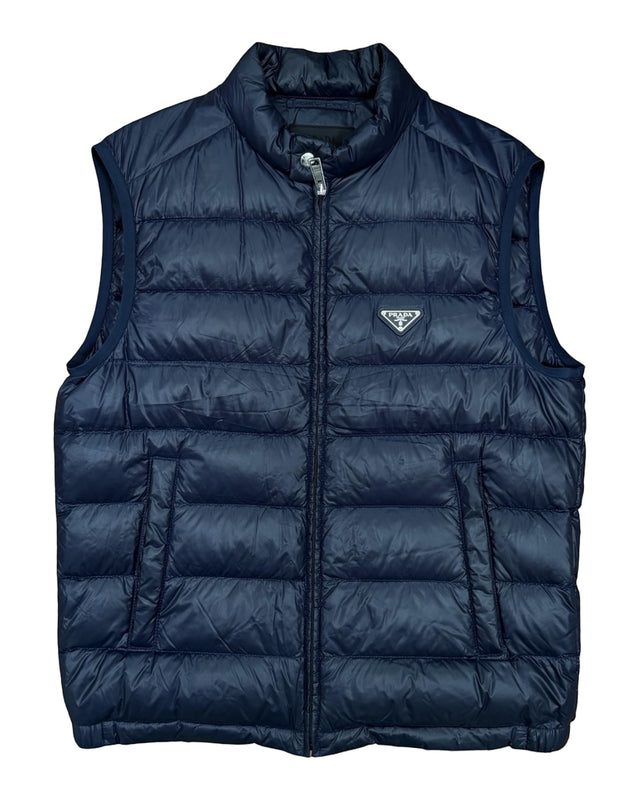 DRIPNORD navy blue Prada puffer vest with zip closure and iconic Prada logo on chest. Size 50/M.