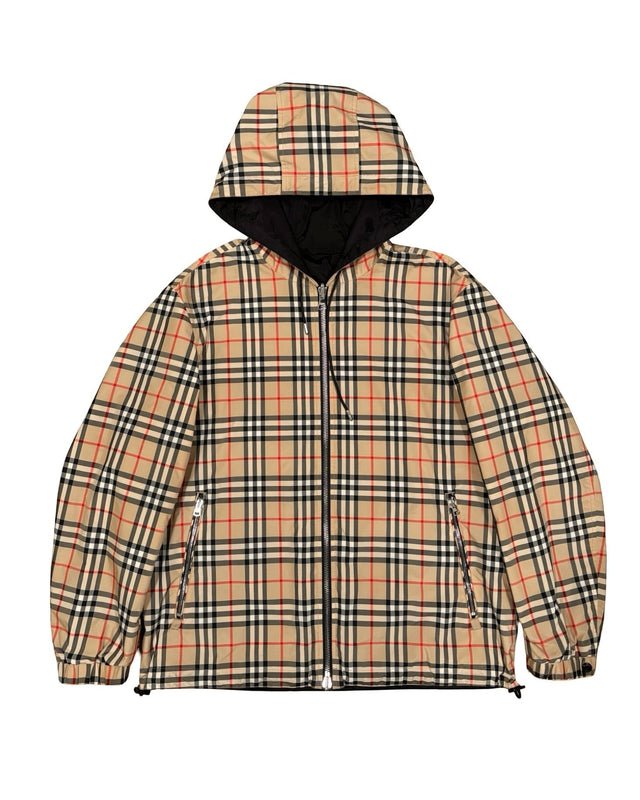 DRIPNORD beige, black, and red plaid reversible hooded jacket with zip closure and pockets.