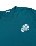 DRIPNORD teal cotton t-shirt with double Moncler logo patch on chest. Crew neck, short sleeves.