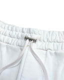 DRIPNORD white cotton Amiri Arts District shorts with drawstring and silver hardware detail.