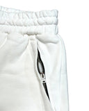DRIPNORD white cotton Amiri Arts District shorts with elastic waistband and silver zipper detail.