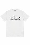 DRIPNORD white cotton t-shirt with black DIOR logo and safety pin detail. Crew neck, short sleeves.