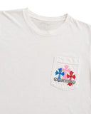 DRIPNORD white cotton t-shirt with multi-colored cross graphic on chest pocket and Chrome Hearts logo.